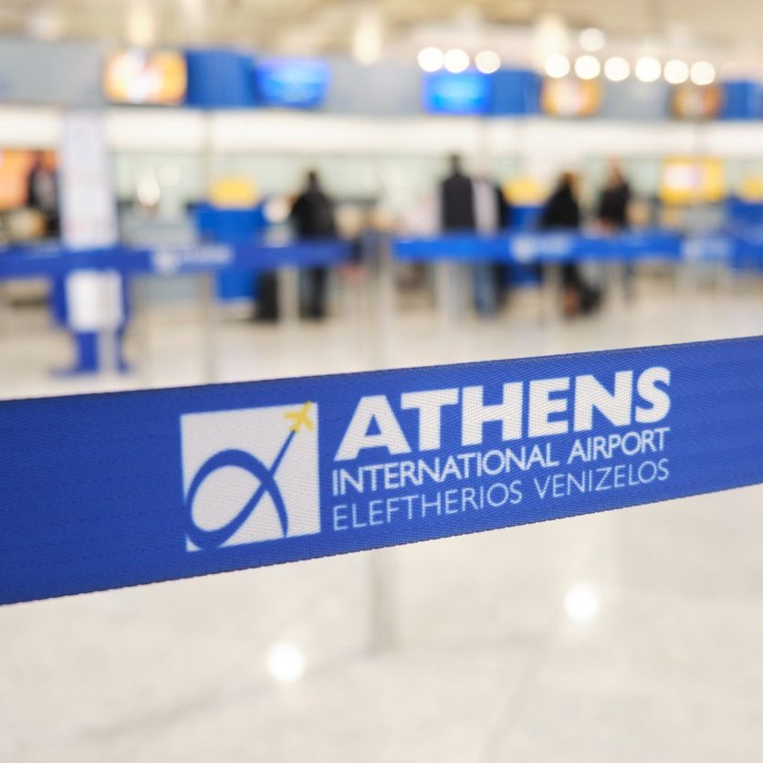 Athens International Airport Eleftherios Venizelos, Greece - November 4, 2019: Retractable belt, portable ribbon barrier, fencing tape.